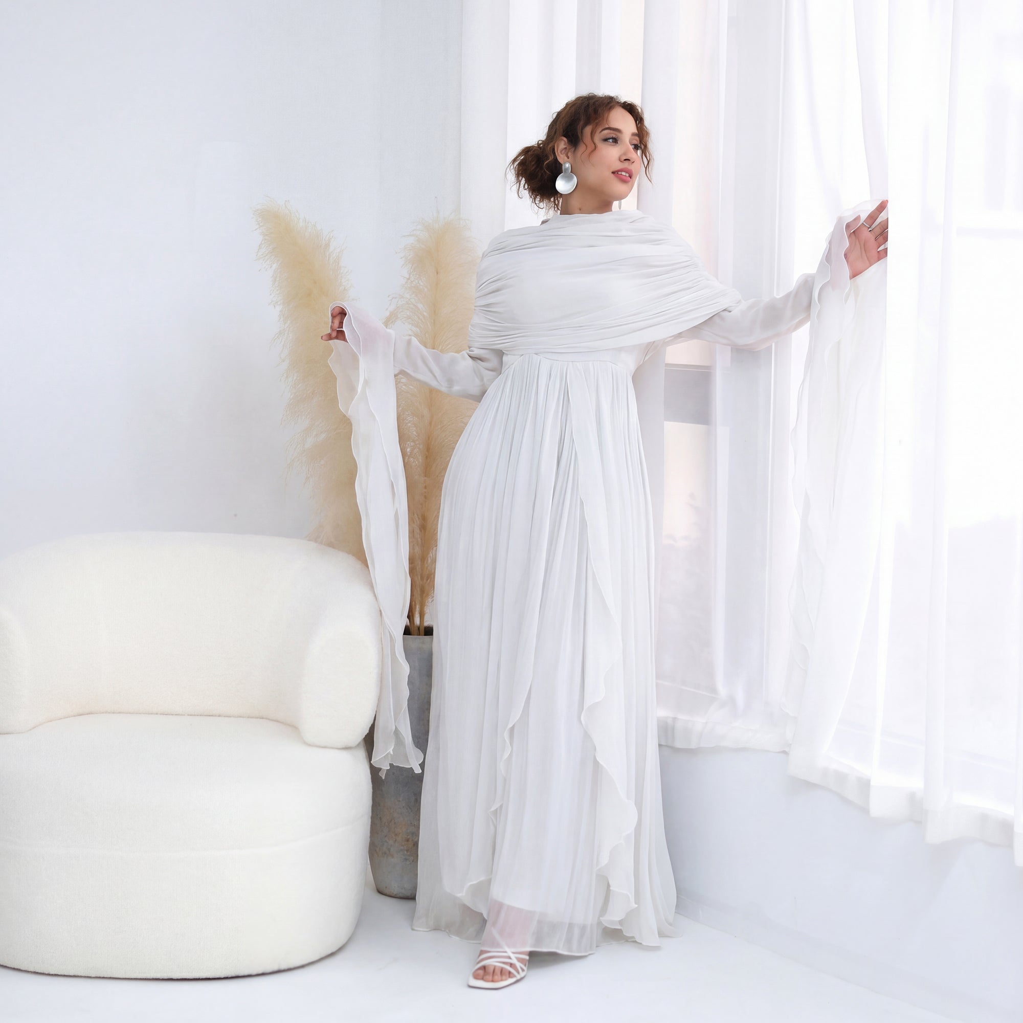 Double-layered dress with a waist-hugging design and a sleeveless vest, priced at 1169, without a headscarf