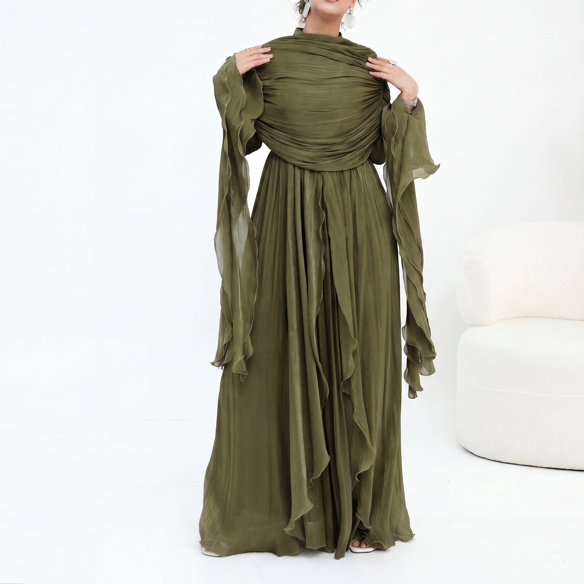 Double-layered dress with a waist-hugging design and a sleeveless vest, priced at 1169, without a headscarf